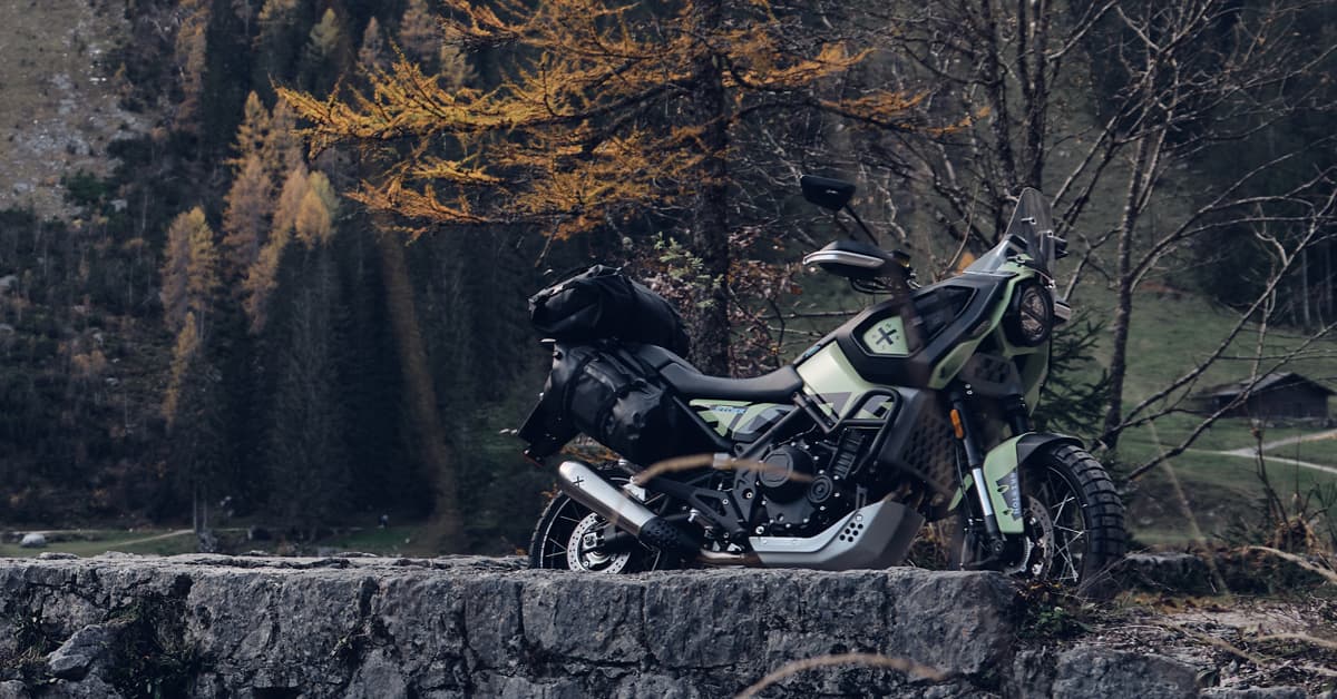 Brixton Sturr parked on a stone bridge in the countryside