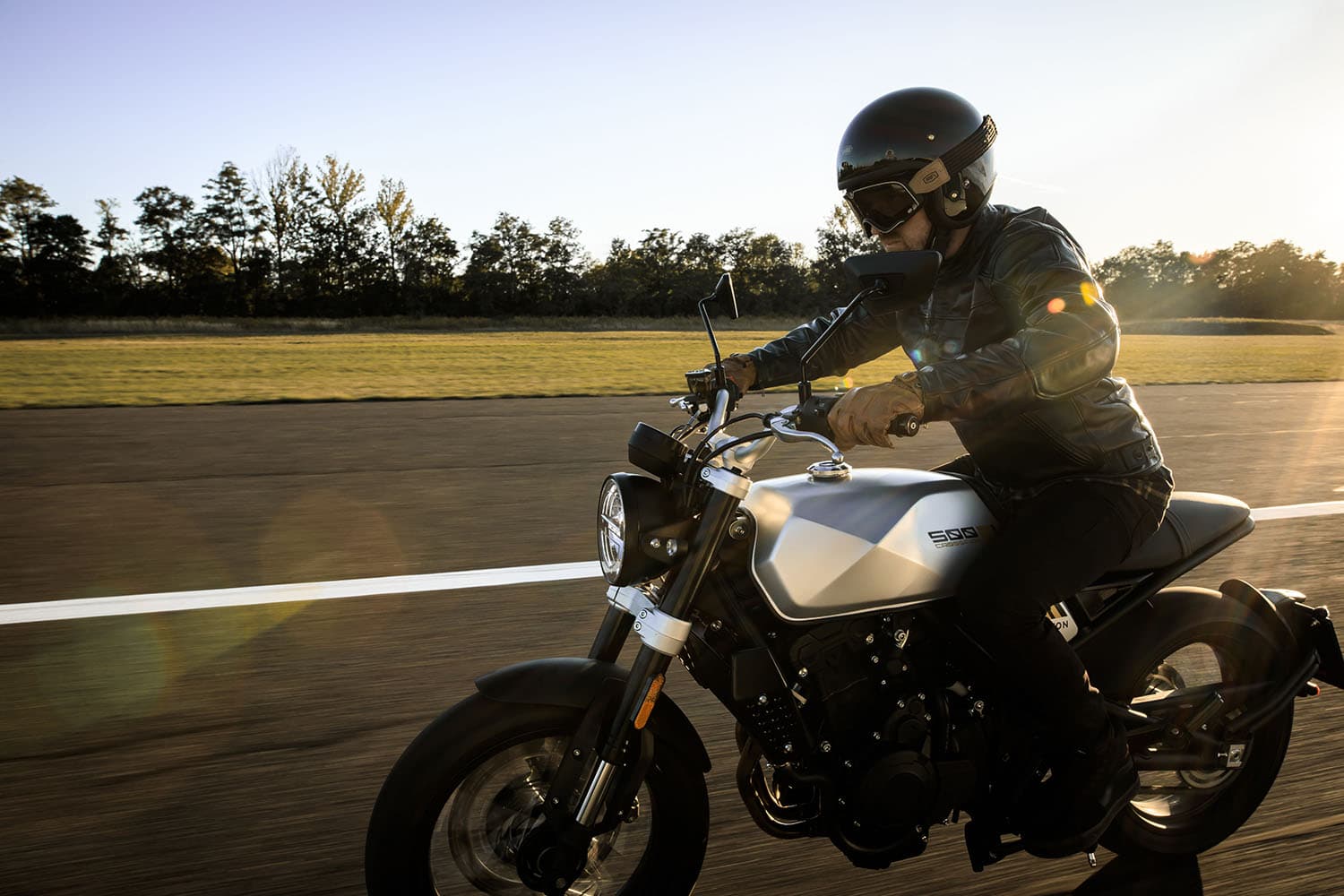 Brixton Crossfire 500 in Bullet Silver going fast on tarmac