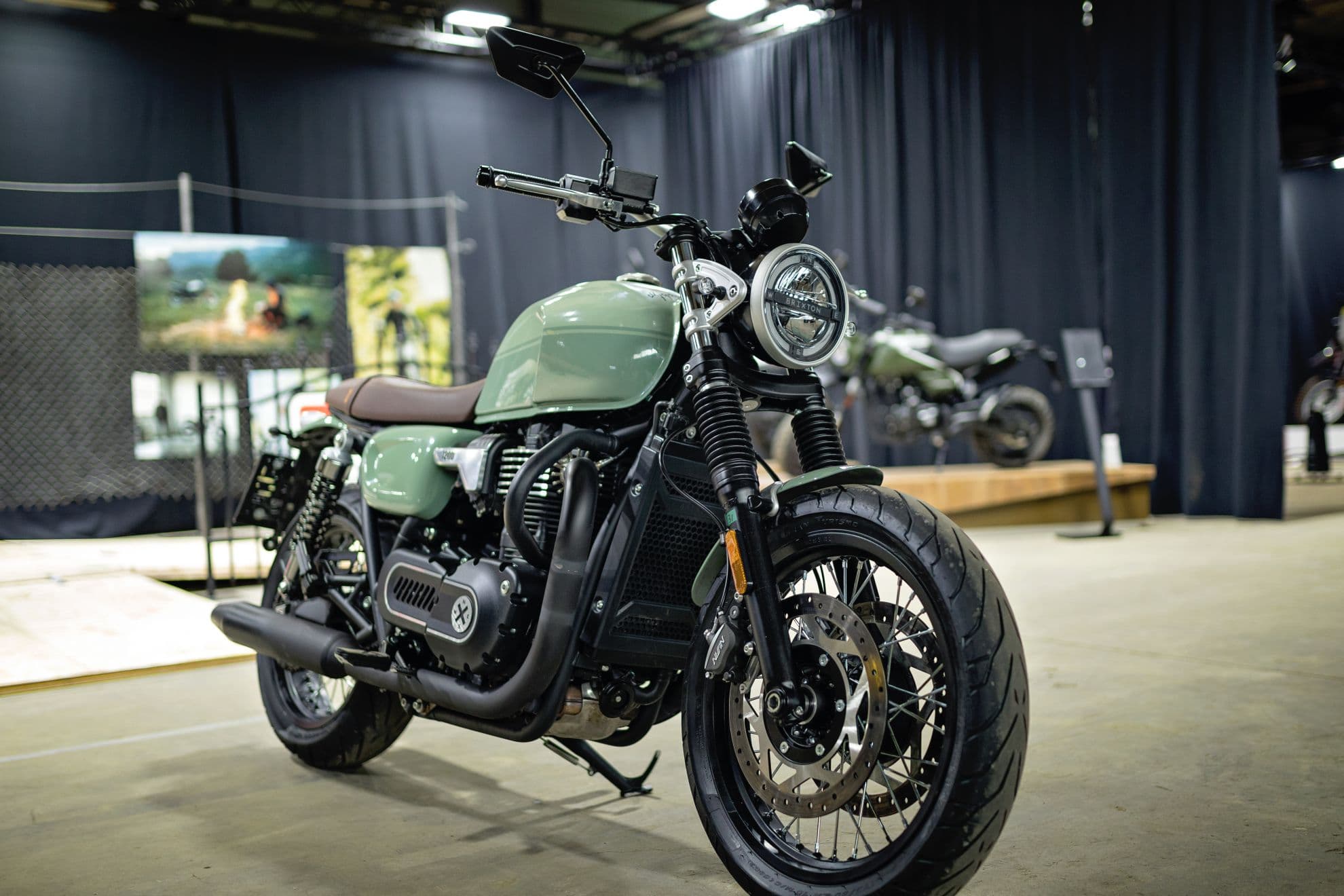 Landscape photo of the Brixton Cromwell 1200 in Cargo Green photographed in a showroom