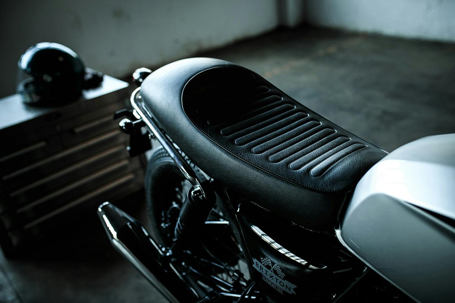 Close-up of the black seat of a Brixton Sunray 125 in Bullet Silver