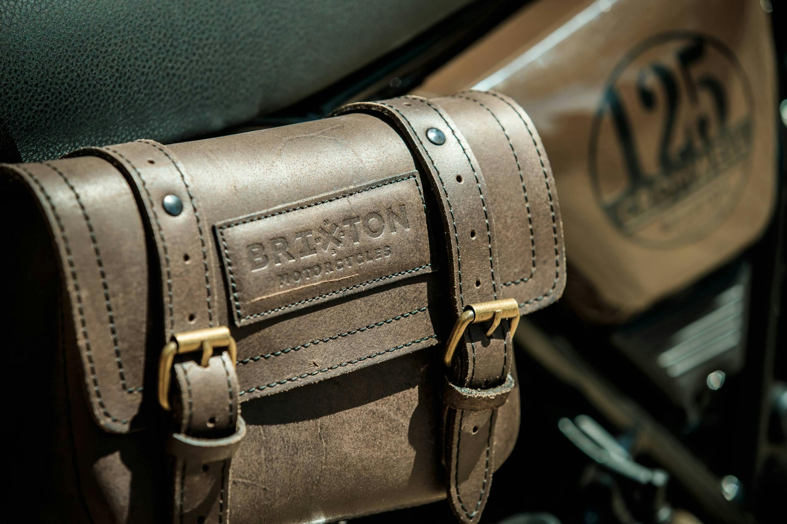 Close-up of the Brixton Cromwell 125 in Charly Brown showing the side satchel