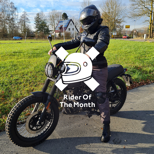 Rider of the month Veronika on her Felsberg 125 in Timberwolf Grey with the "Rider of the Month" logo 